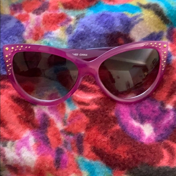 Cute pair of fuchsia sunglasses with gold studs